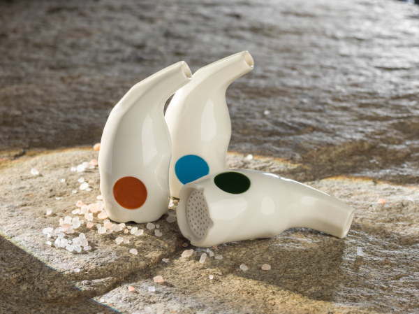 3 Salzpfeifen stehen auf einem Stein